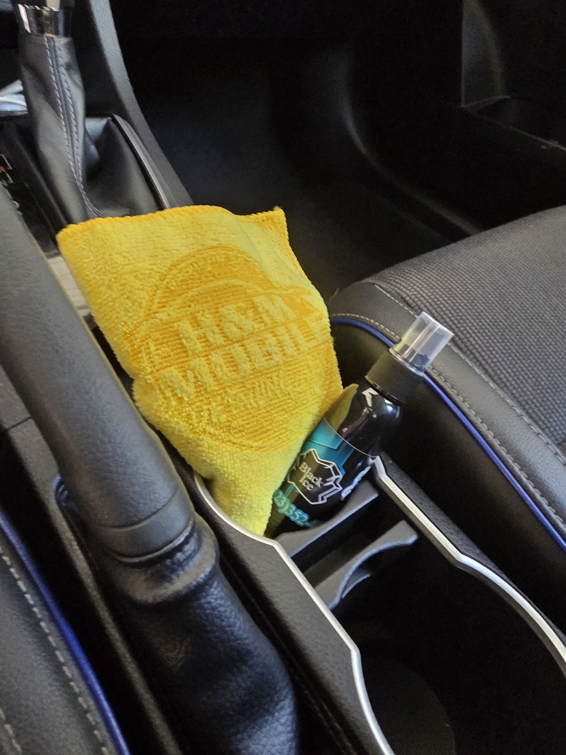 Interior detailing products and microfiber towel