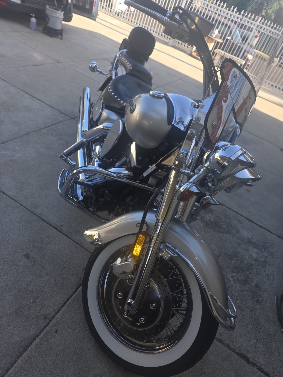 Silver motorcycle polished after detailing